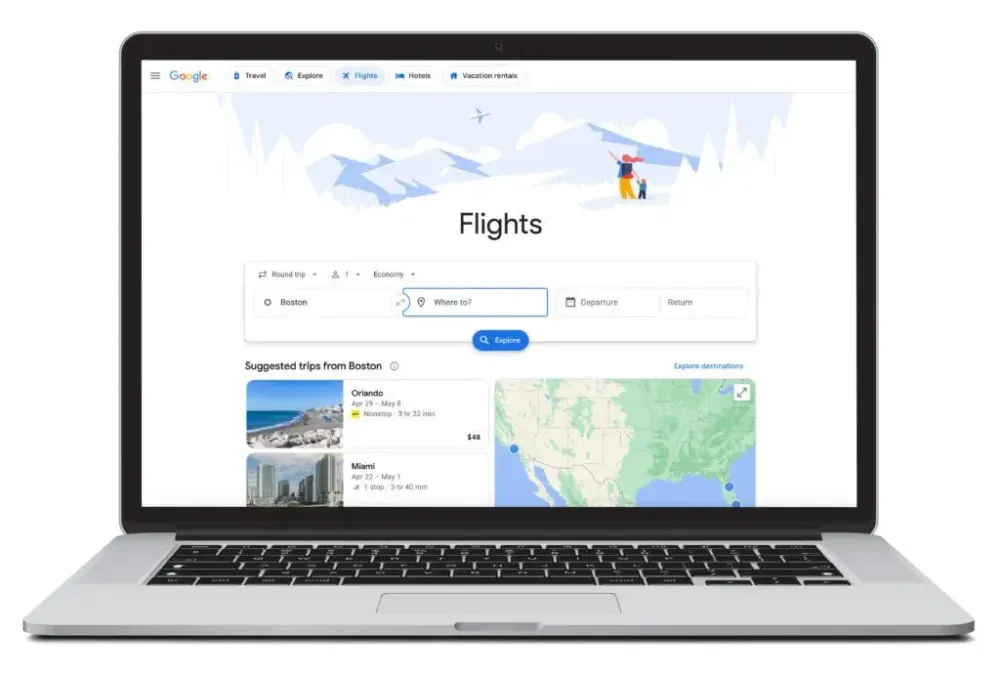 Open laptop showing the flight search homepage for Google Flights